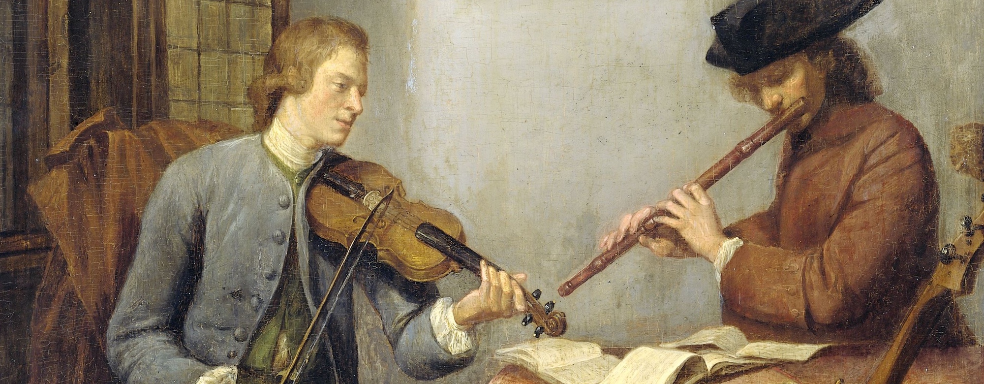 Een violist en een fluitist musicerend